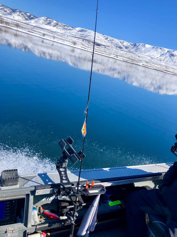 Rod tender in use on water in the winter salmon fishing